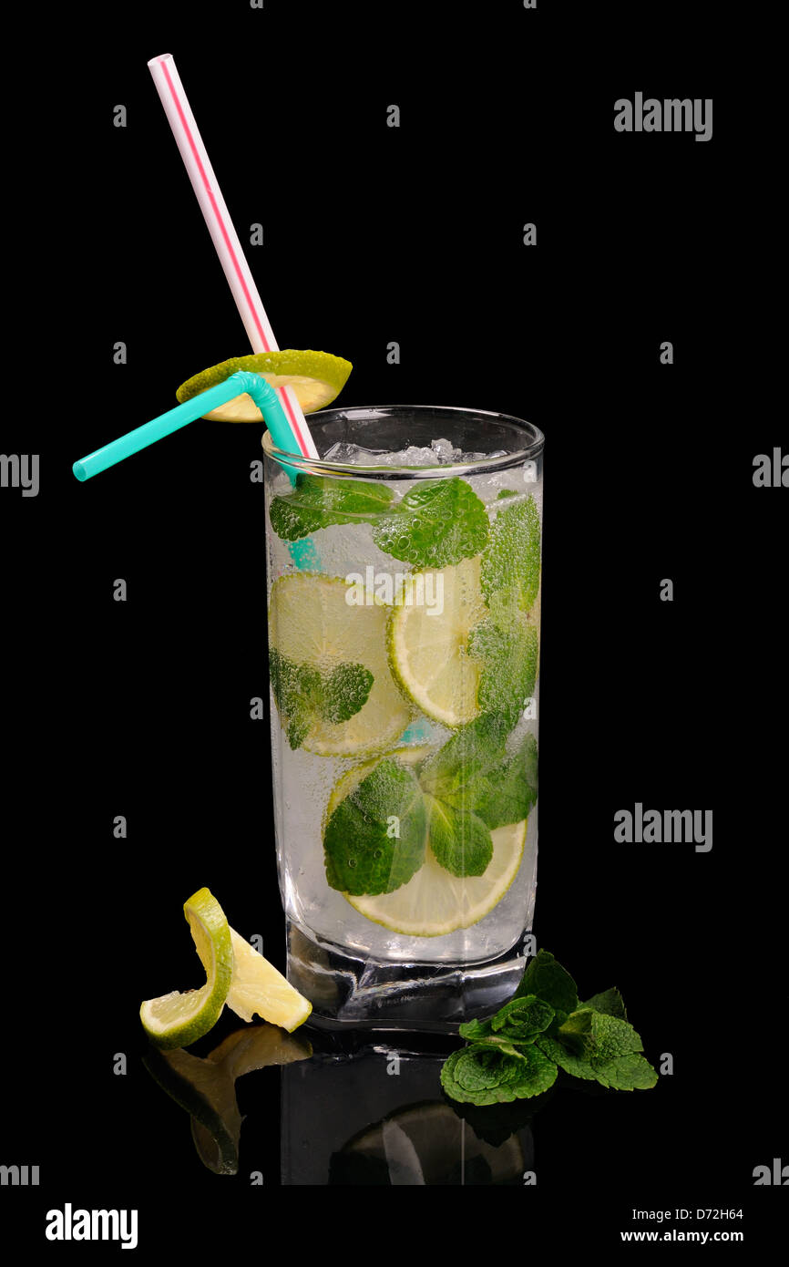 Mojito refreshing cocktail on black reflecting background Stock Photo