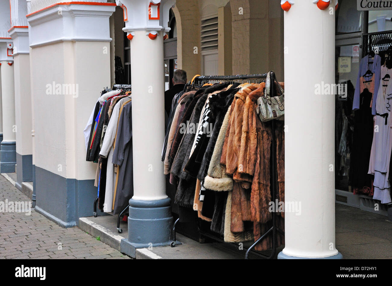 Maidstone, Kent, England, UK. Fur coats on a rack outside shop Stock Photo