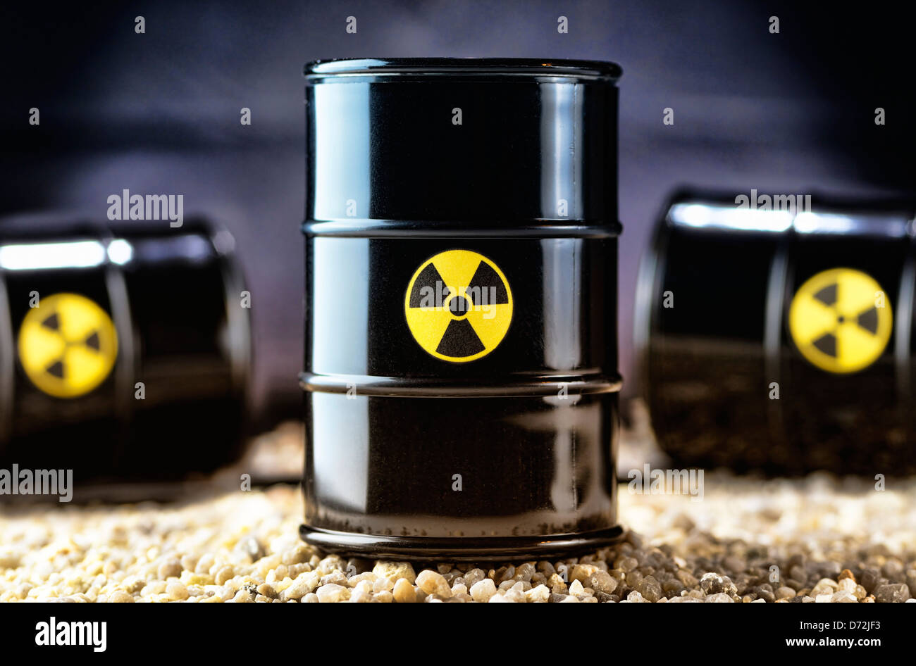 Three nuclear waste barrels Stock Photo