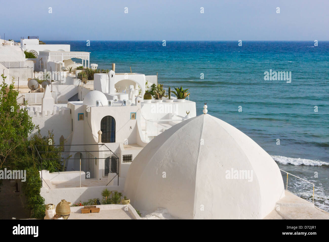 Traditional white houses along the beach, Hammamet, Tunisia Stock Photo