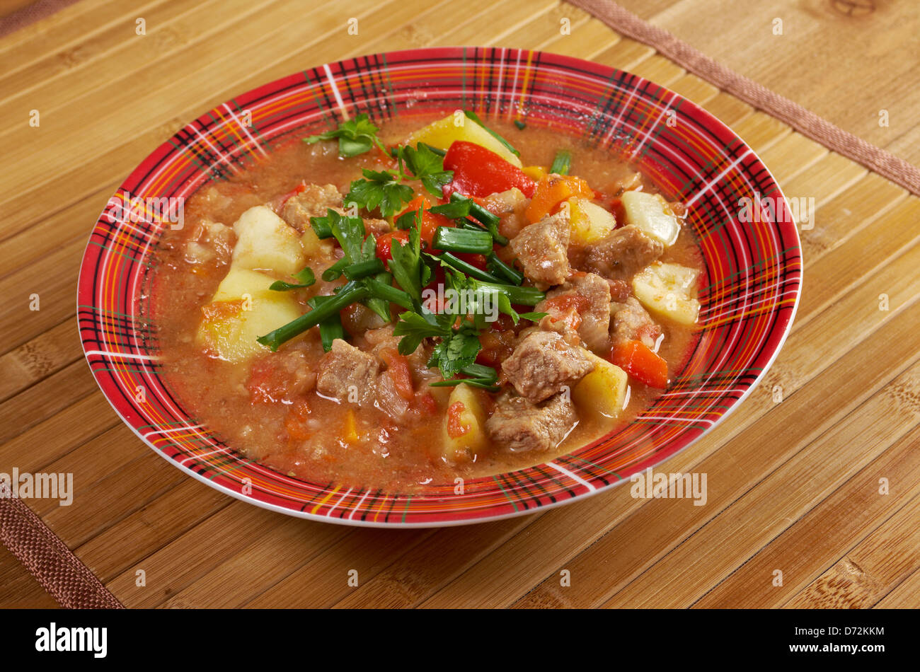 Traditional Hungarian homemade hot goulash soup Stock Photo