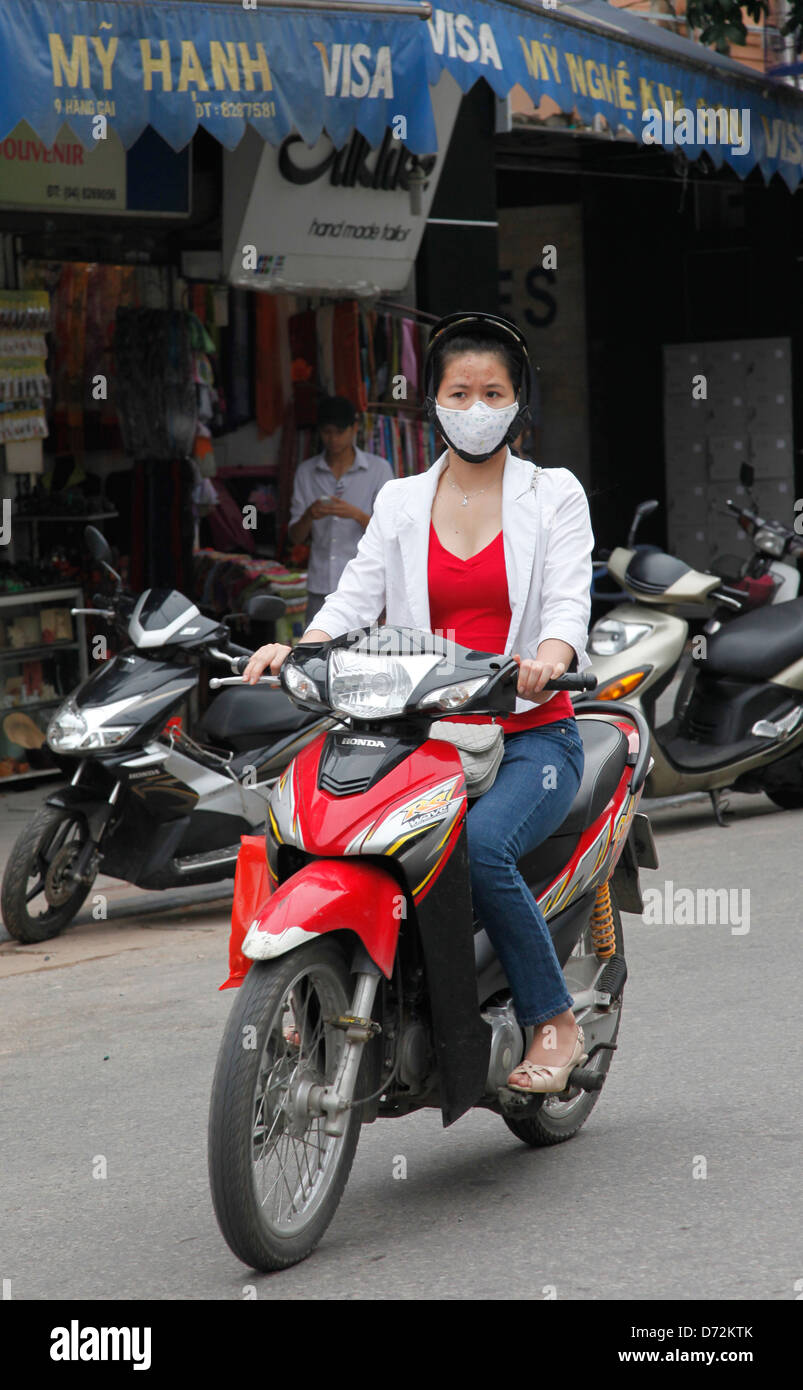 Hanoi, Vietnam, moped driver on the road Stock Photo Alamy