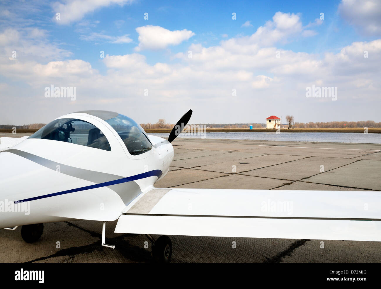 A modern light aircraft on the airfield Stock Photo