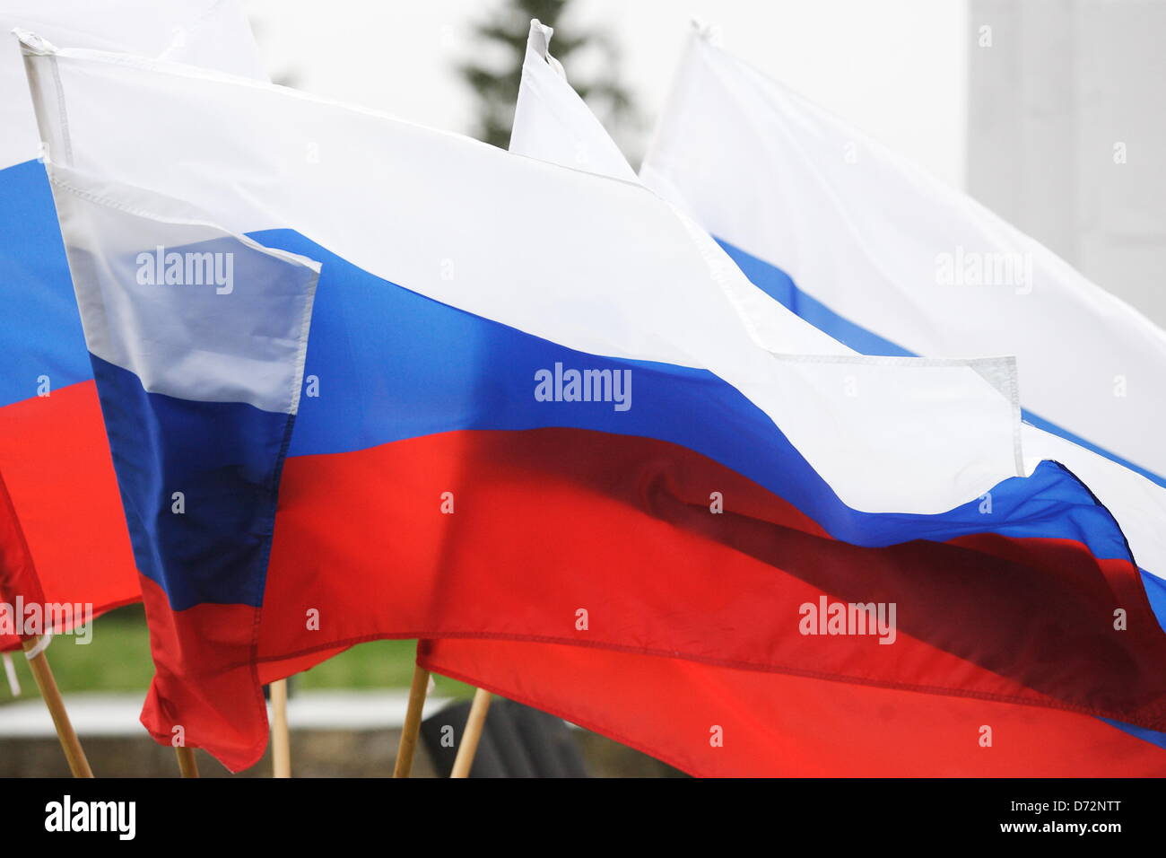 Braniewo, Poland 27th, April 2013 Over 200 bikers come to Poland from Kaliningrad Oblast in Russia to take part in the 68th anniversary of World War II end at the Soviet Army cemetery in Braniewo. Pictured: Russian Federation National flag. Credit: Michal Fludra/Alamy Live News Stock Photo