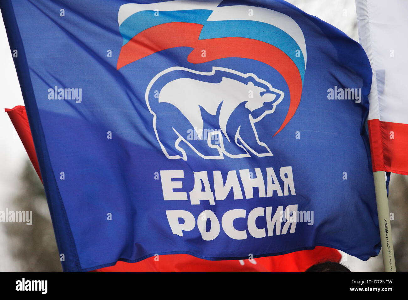 Braniewo, Poland 27th, April 2013 Over 200 bikers come to Poland from Kaliningrad Oblast in Russia to take part in the 68th anniversary of World War II end at the Soviet Army cemetery in Braniewo. Pictured: United Russia pro Russian government party flag. Credit: Michal Fludra/Alamy Live News Stock Photo