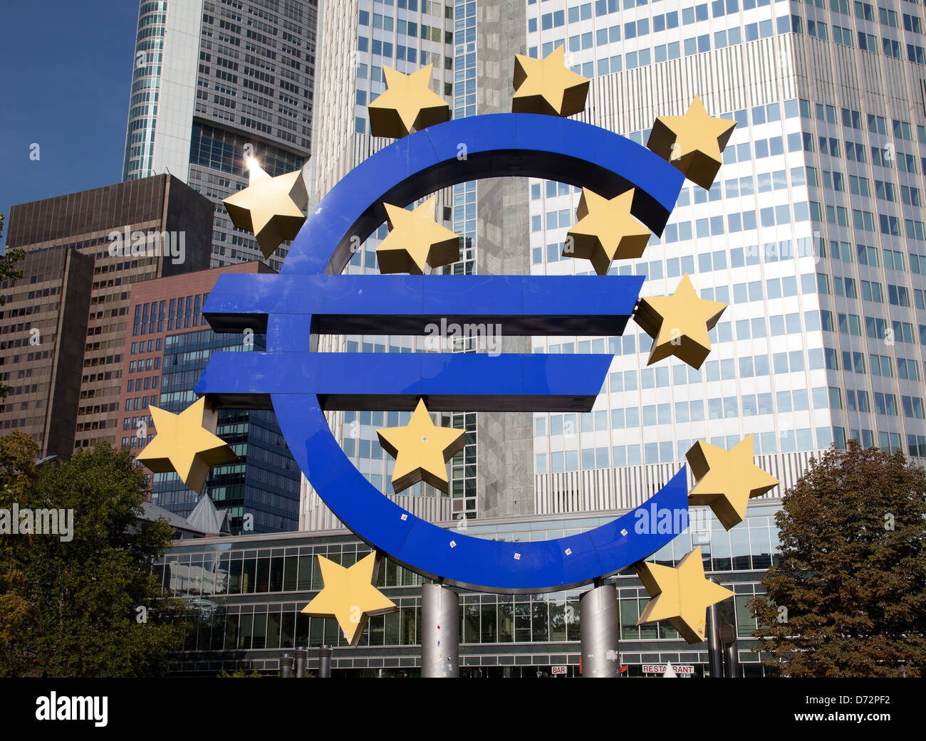 Frankfurt, Germany, the Euro sculpture in front of the Tower of the ECB euro Stock Photo