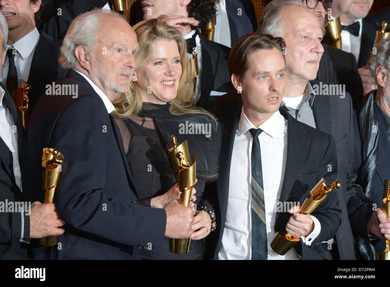 Actors Michael Gwisdek (L-R), Barbara Sukowa and Tom Schilling gesture with their awards during 'Lola' German Film Award in Berlin, Germany, 26 April 2013. Photo: Maurizio Gambarini Stock Photo