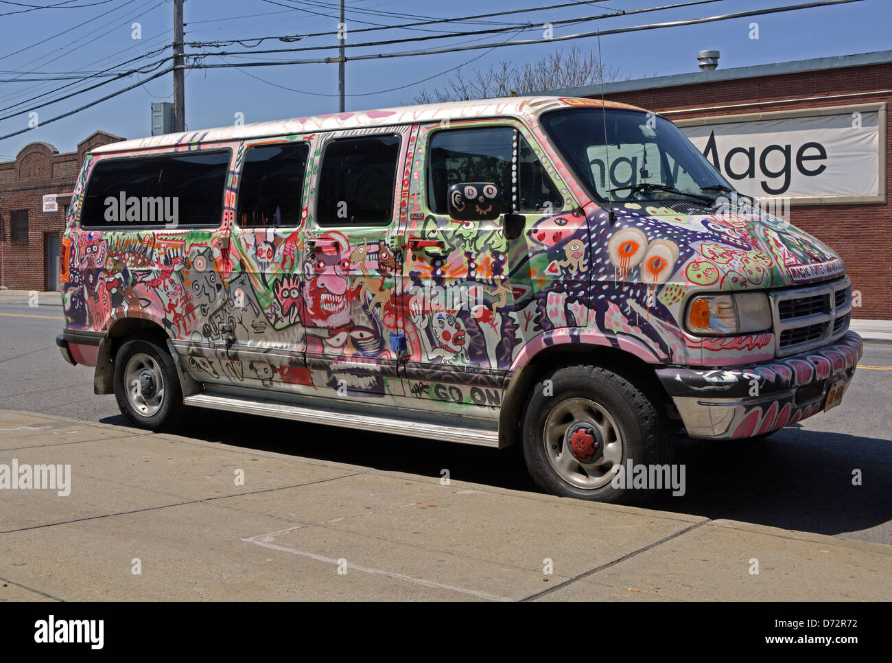 MInivan completely painted with graffiti in Woodside Queens, New York Stock Photo