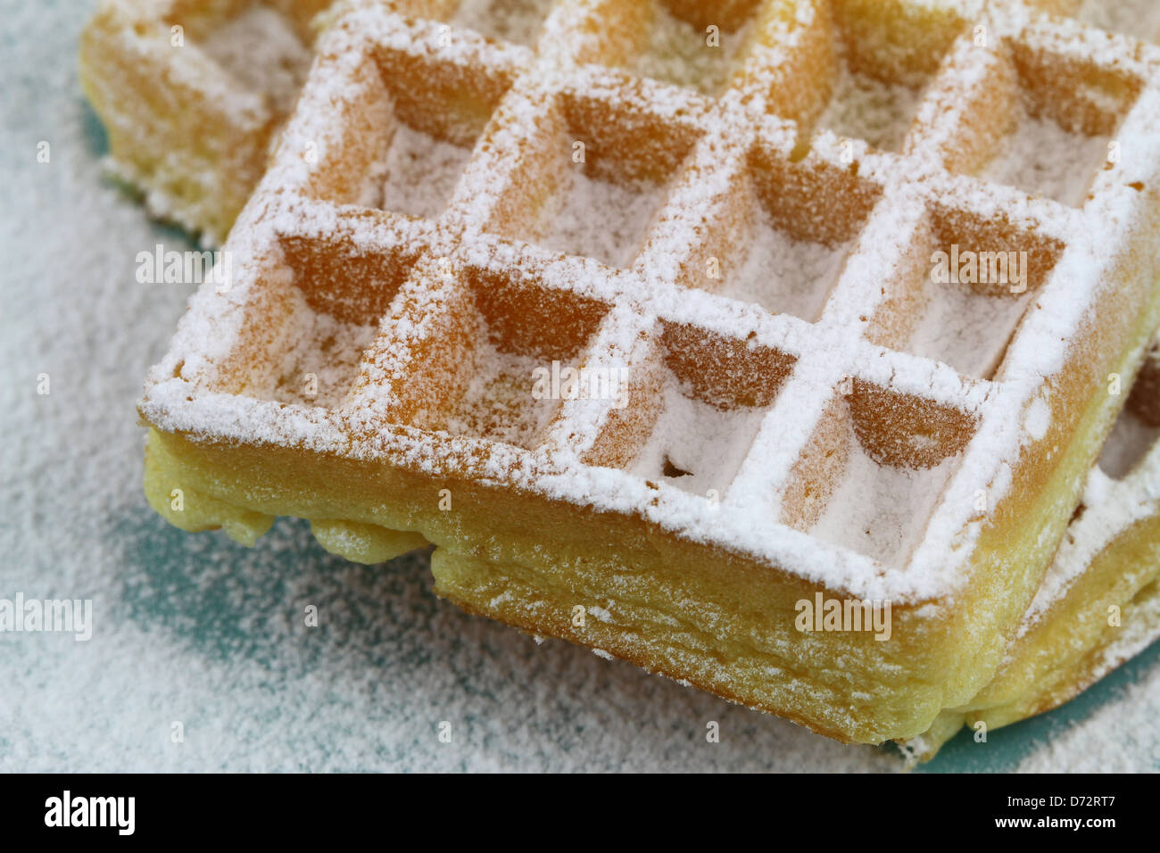 Vanilla wafer dusted with icing sugar, close up Stock Photo