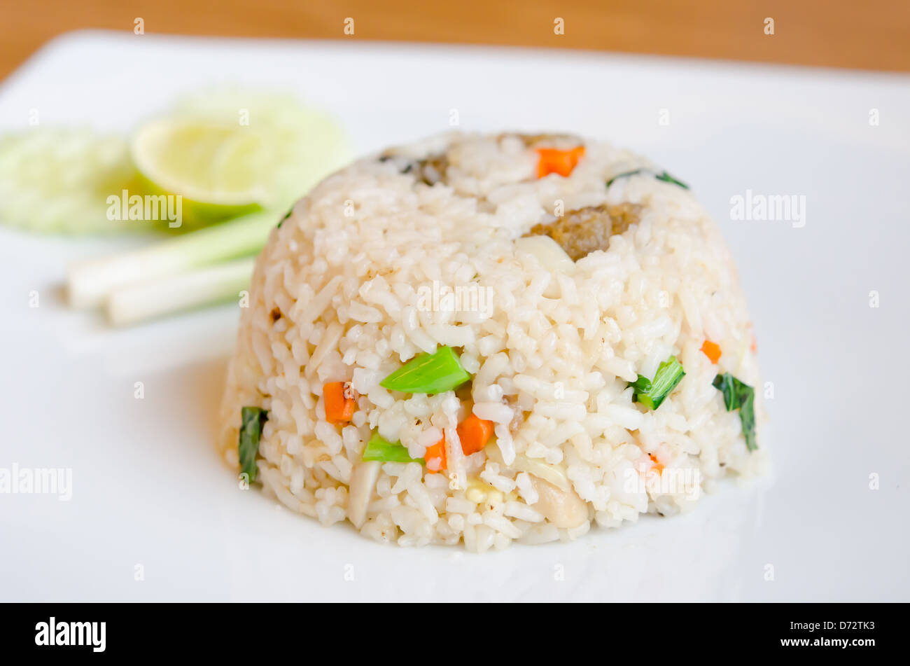 Mixed Cooked Rice Mixed cooked rice with fried fish and sauce , served with fresh ...