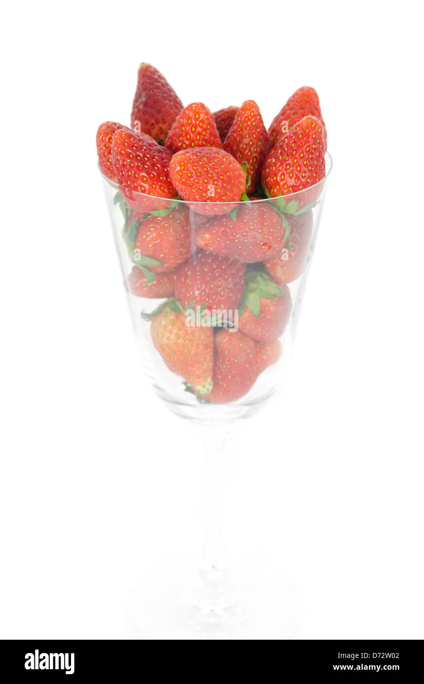 ripe strawberry full in glass on white background Stock Photo - Alamy