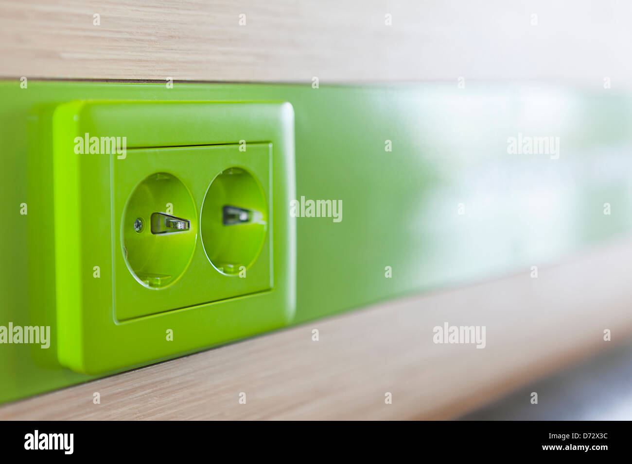 Green appliance receptacle for charging. Close up Stock Photo