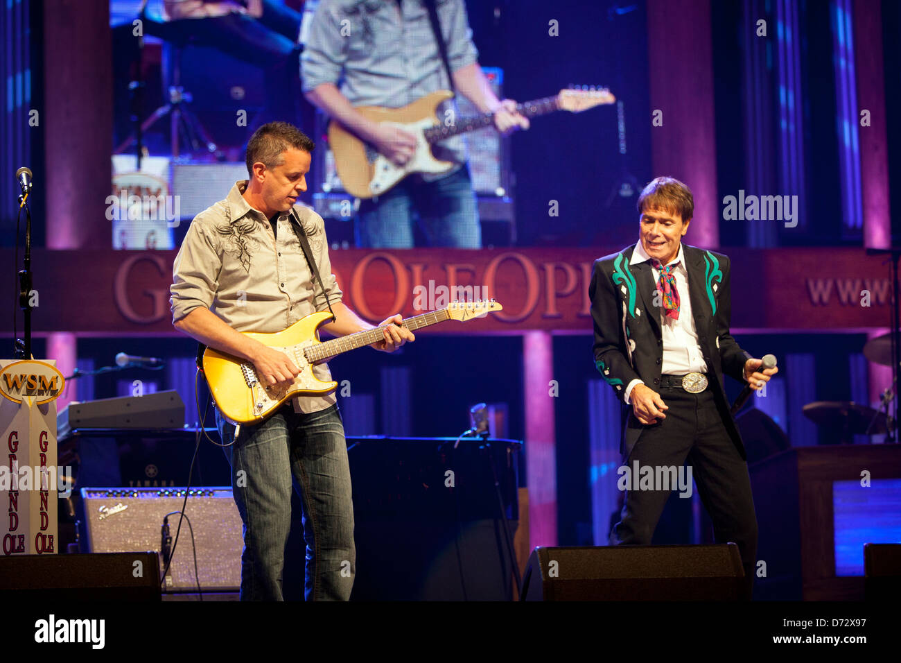Sir Cliff Richard performs with guitarist Steve Mandile at the Grand Ole Opry, Nashville Tennessee, USA Stock Photo