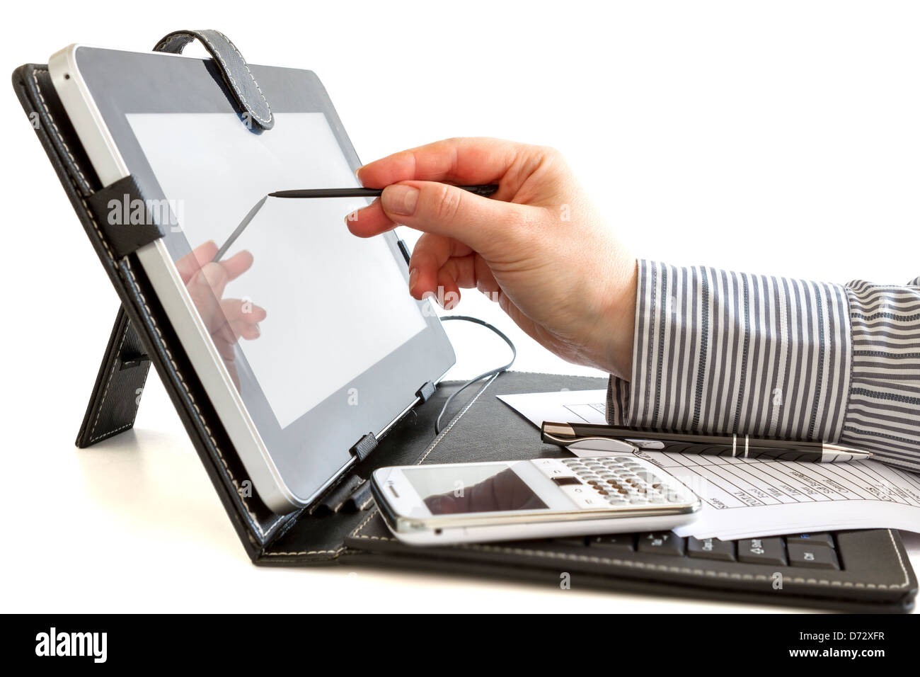 Business woman hand typing on touch screen of digital tablet Stock Photo