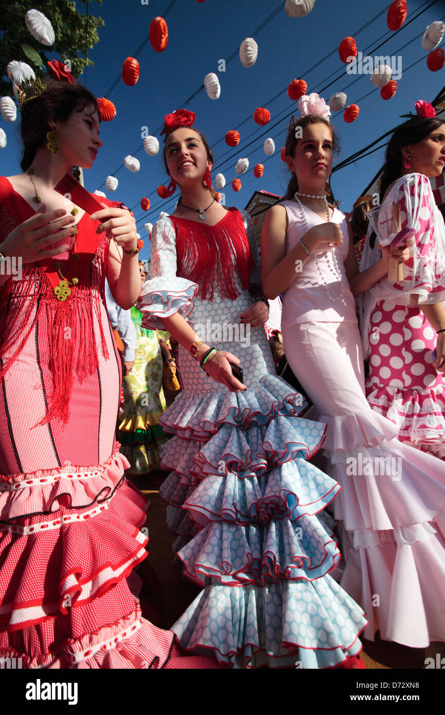 Girls wearing flamenco dresses at the Feria de abril, Seville, Spain