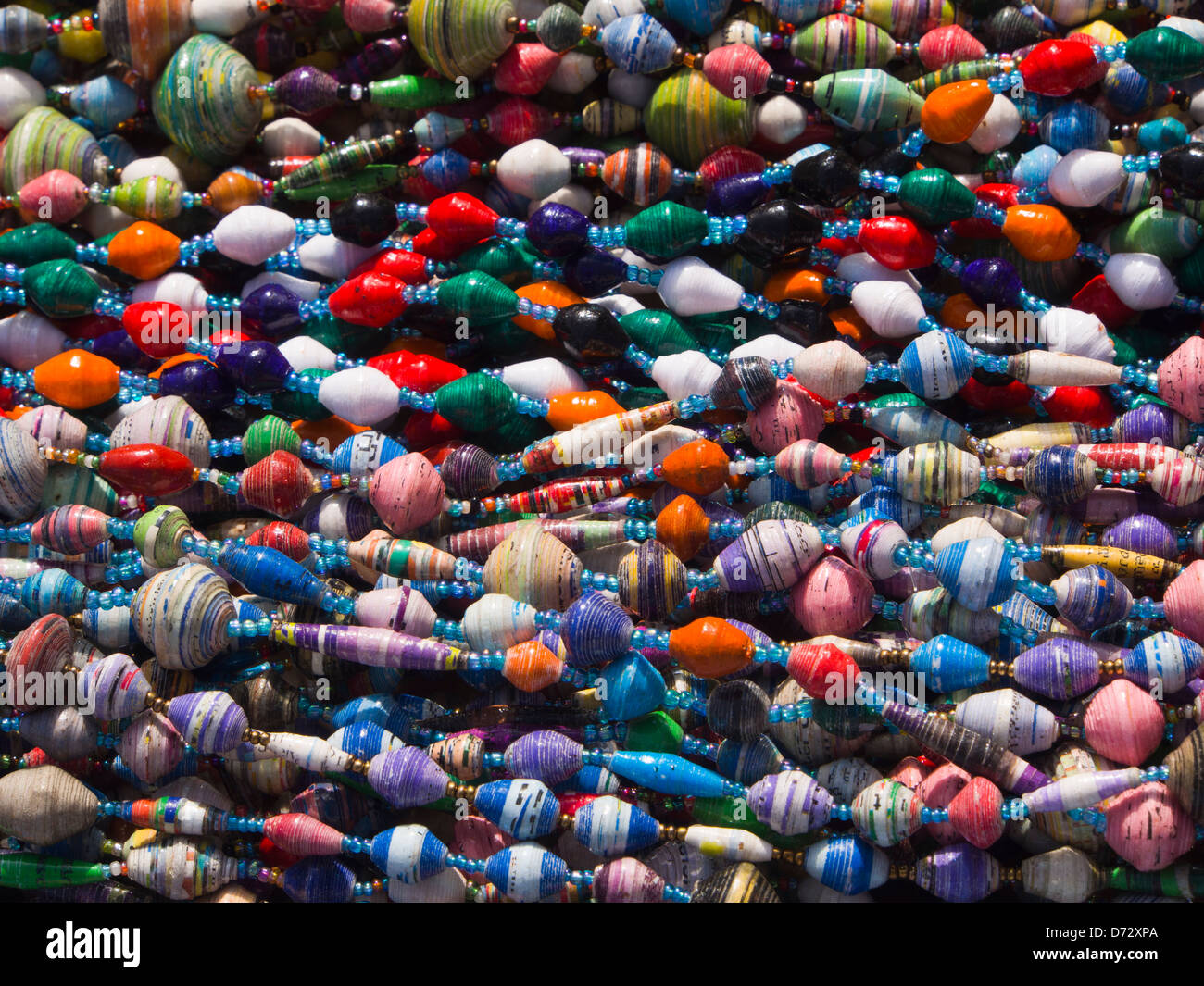 Rows of colourful bead necklaces on display in a flea market in Grunerlokka Oslo Norway Stock Photo