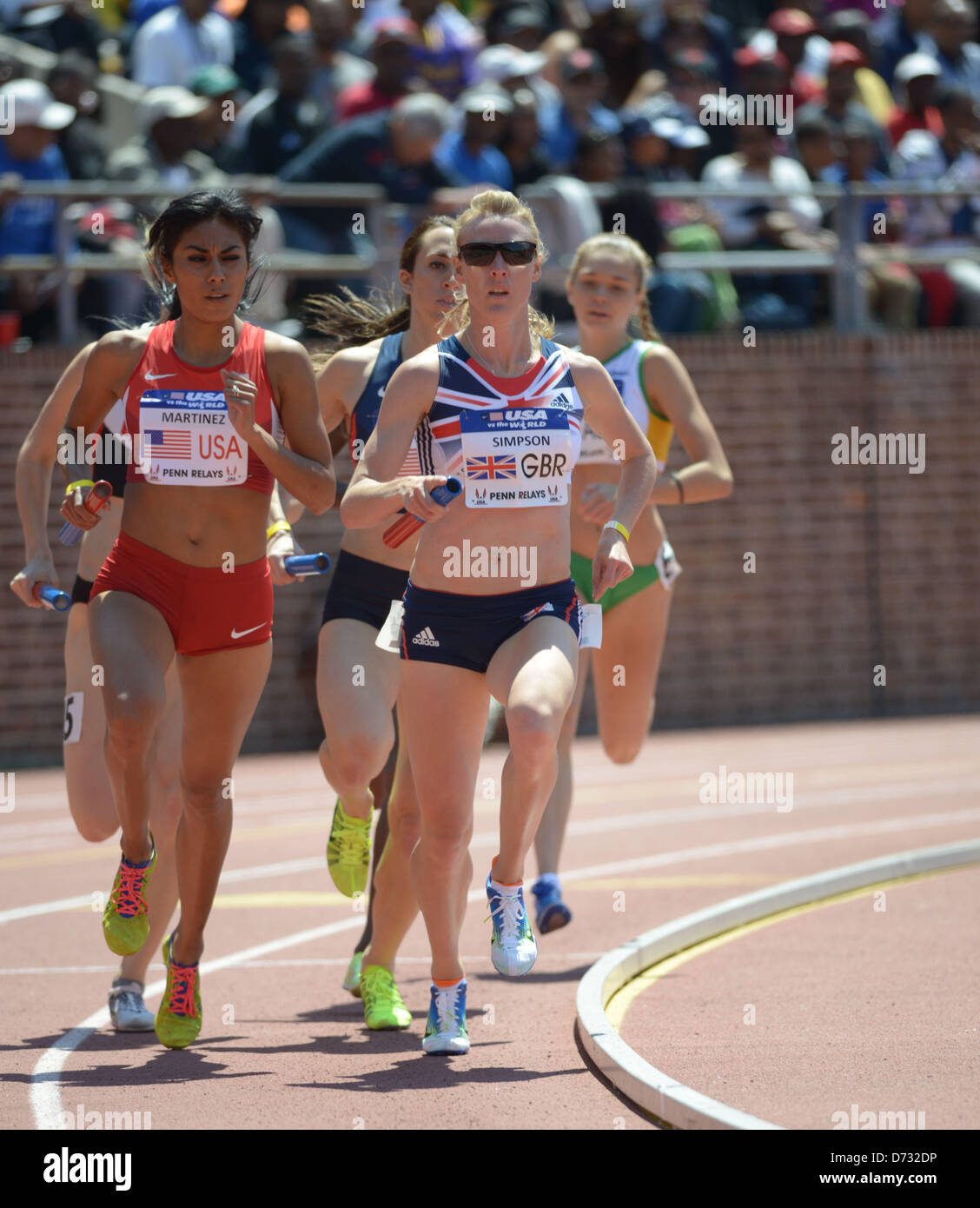 April 27, 2013 - Philadelphia, Pennsylvania, U.S - BRENDA MARTINEZ of the USA , JEMMA SIMPSON of Great Britain in the 4x800 in the ''USA vs The World' competition at the Penn Relays which was held at the University of Pennsylvania's historical Franklin Field in Philadelphia (Credit Image: © Ricky Fitchett/ZUMAPRESS.com) Stock Photo