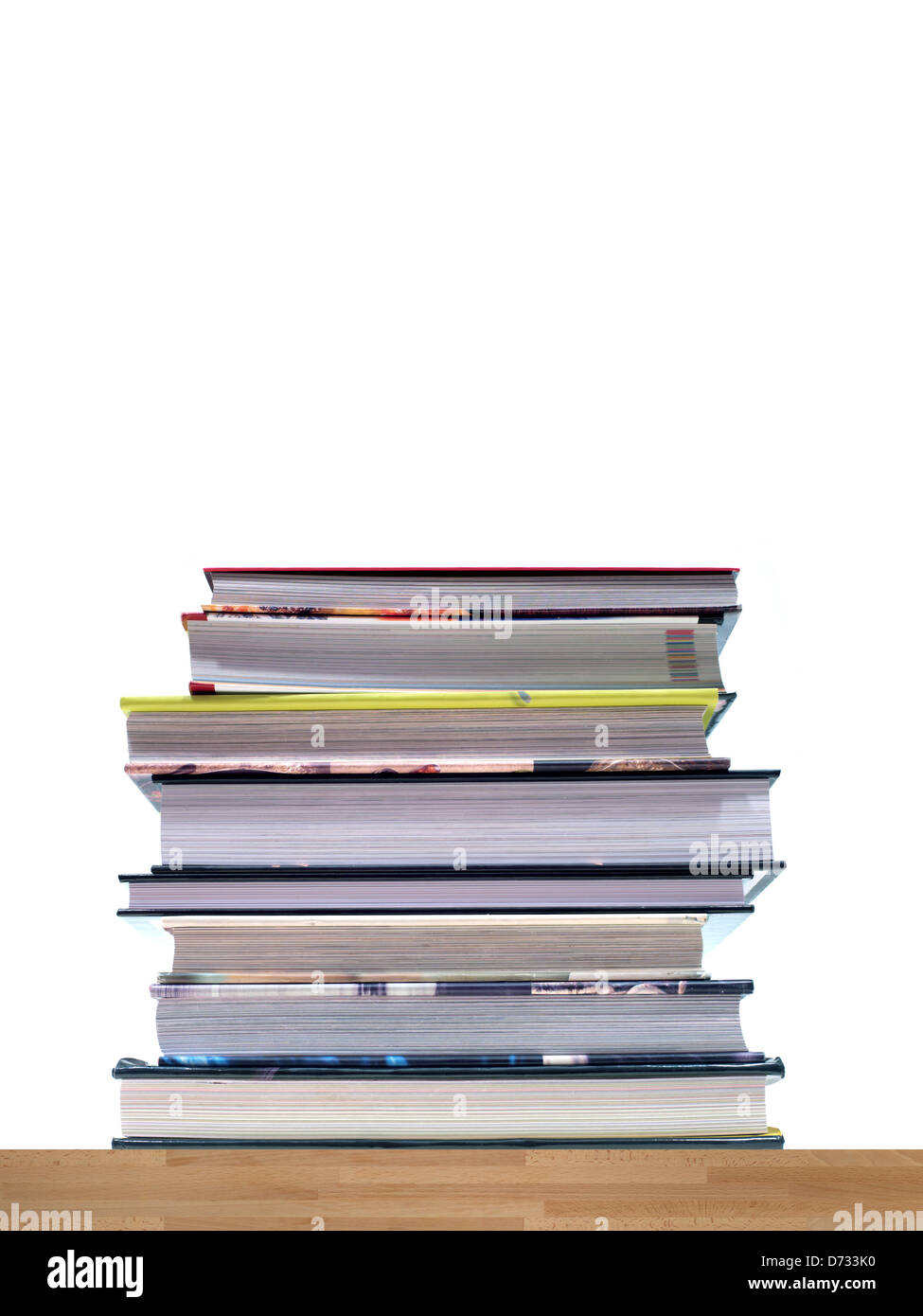 A book stack isolated against a white background Stock Photo - Alamy