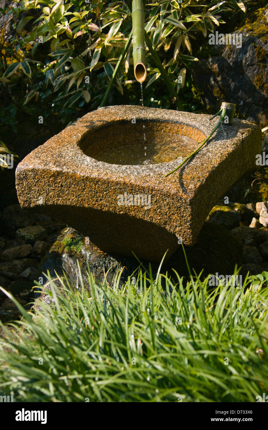 Stone water basin in a Japanese garden, Kyoto, Japan Stock Photo Alamy