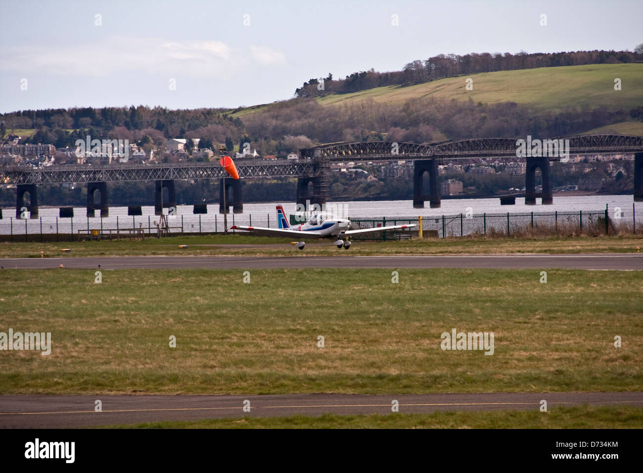 A German aircraft of the Tayside Aviation Grob G115 Tutor T.1 / Heron G-BVHG taking off from the Runway at Dundee Airport ,UK Stock Photo