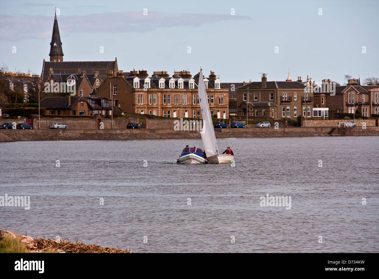 Yacht and Motor Boat of the Royal Tay Yacht Club collide together during a training session on Broughty Ferry Bay in Dundee,UK Stock Photo