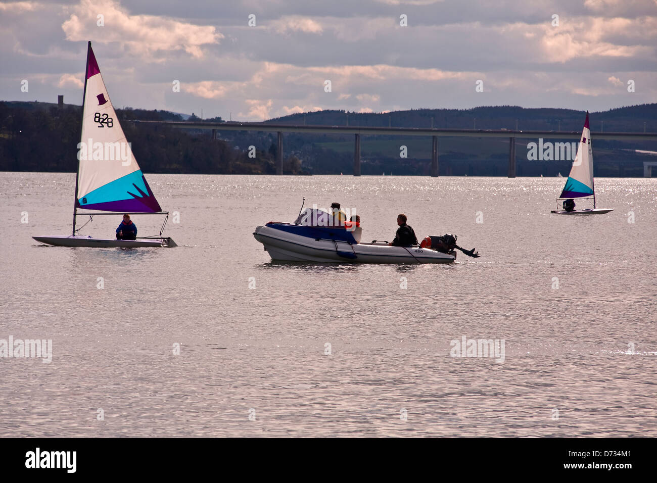Yachts and a rescue boat afloat of the Royal Tay Yacht Club on Broughty Ferry Bay during a training session near Dundee,UK Stock Photo