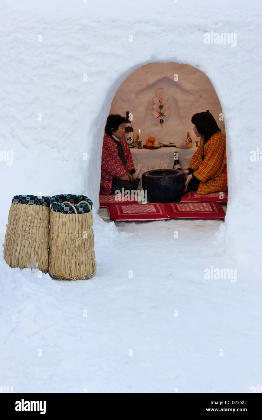 Tourists Eating Rice Cakes And Drinking Sake In Igloo Like Snow Houses At Kamakura Festival Yokote Akita Prefecture Japan Stock Photo Alamy