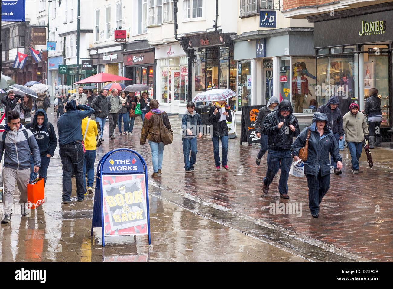 Canterbury High Street Visitors Shoppers Rainy Day Stock Photo