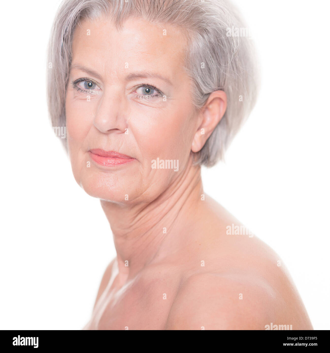 Portrait from a senior woman in front of white background Stock Photo ...