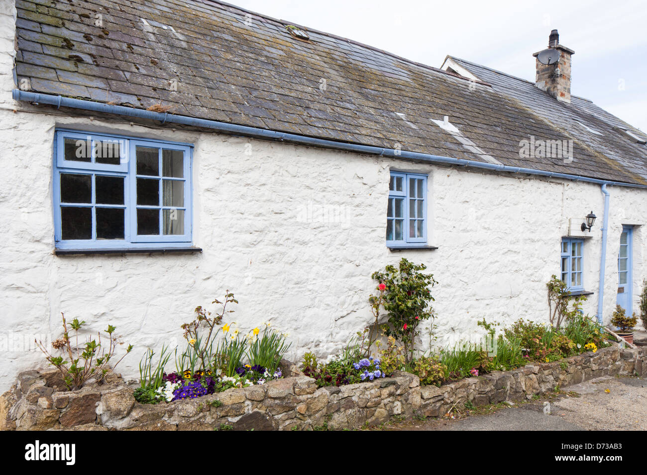 Whitewashed Stone Cottages In The Fishing Village Of Abersoch On