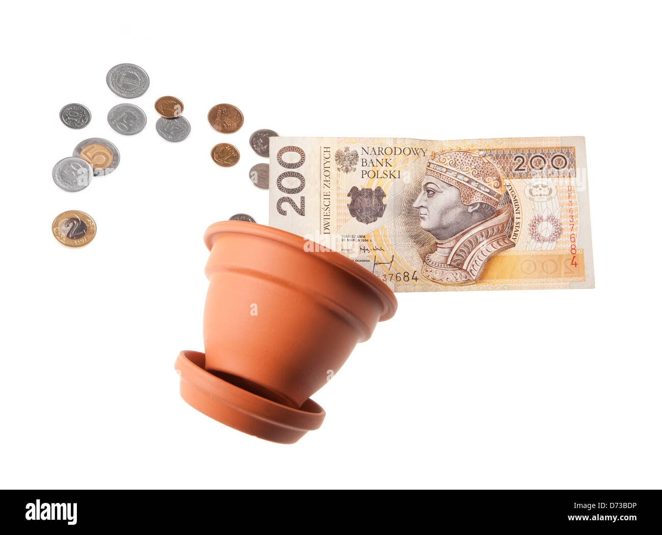 money spilling out of clay flowerpot Stock Photo