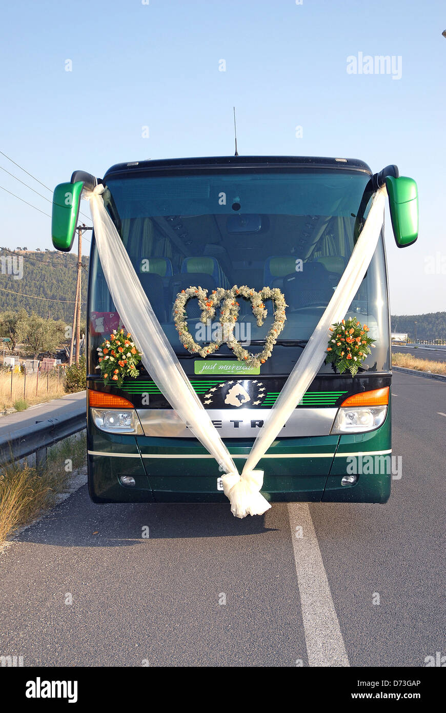 Bus decorated for the wedding of a Greek bus driver Stock Photo