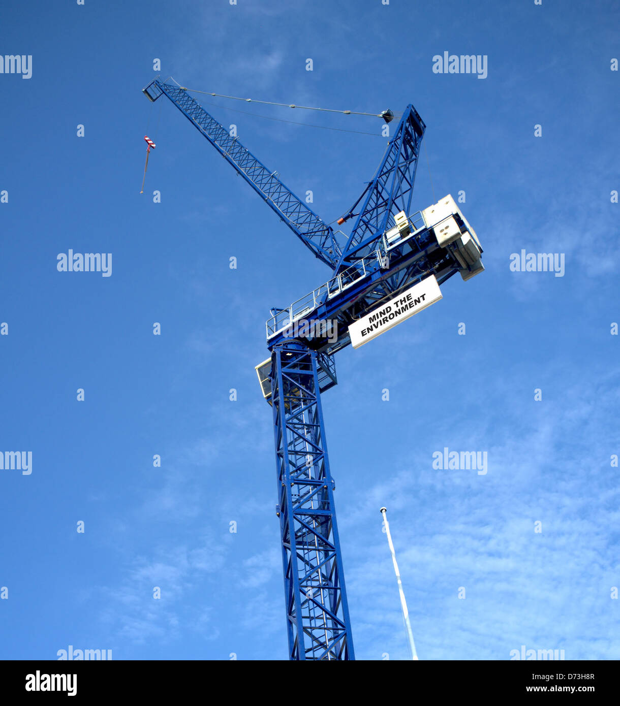 Blue crane with a funny sign Stock Photo - Alamy