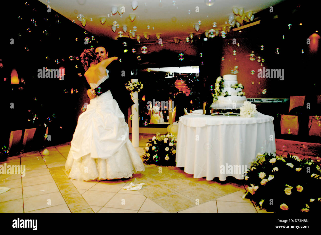 Bride and groom at their first dance on wedding reception (Greece) Stock Photo