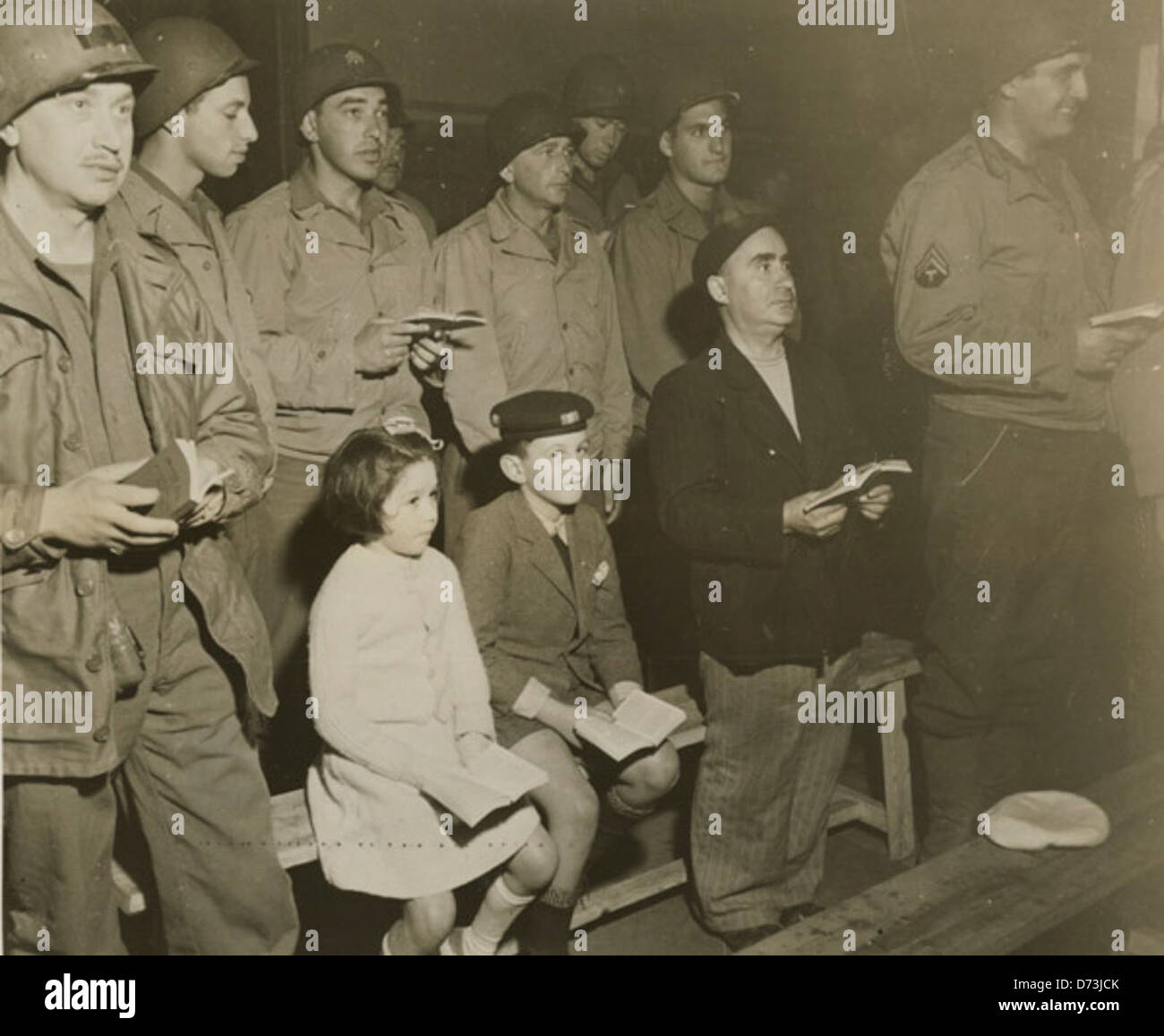Chaplain Manuel M. Poliakoff had three unexpected guests..., March 9, 1945 Stock Photo