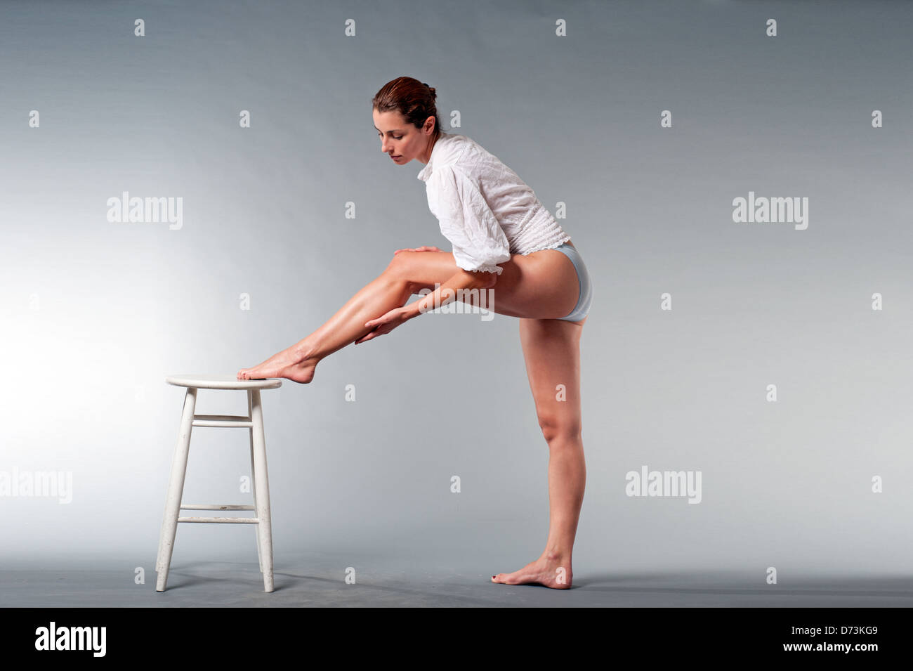 legs, brunette, brunette girl, stool, white Stock Photo