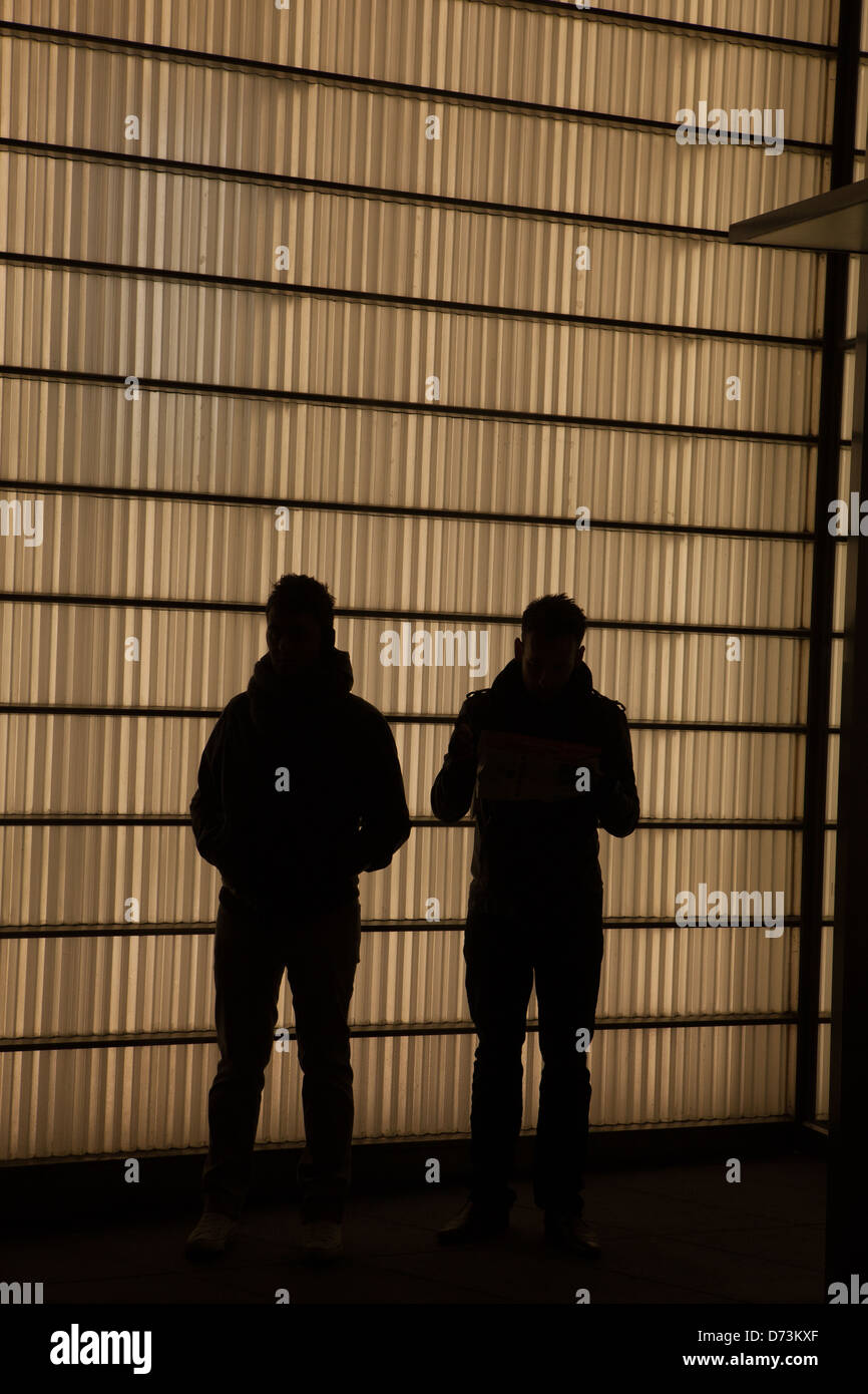 silhouette of two men Stock Photo