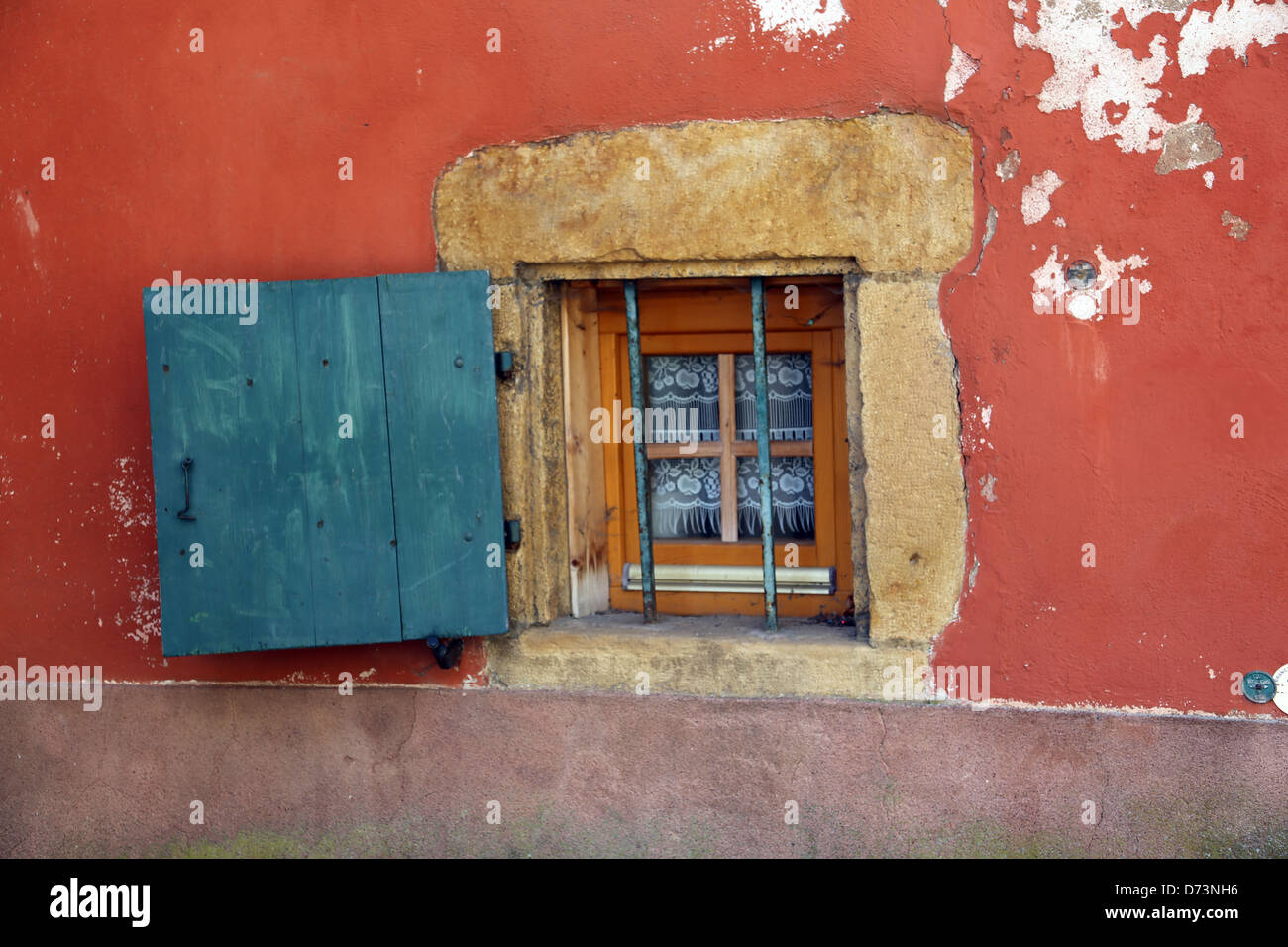 Small window with an open shutter Stock Photo