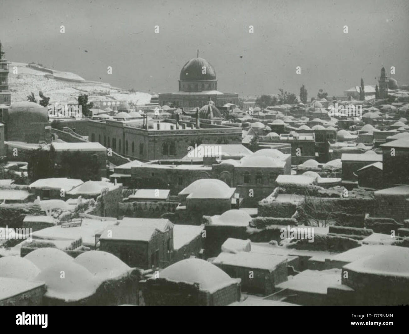 A winter cityscape of Jerusalem covered in snow, showing the city's ...