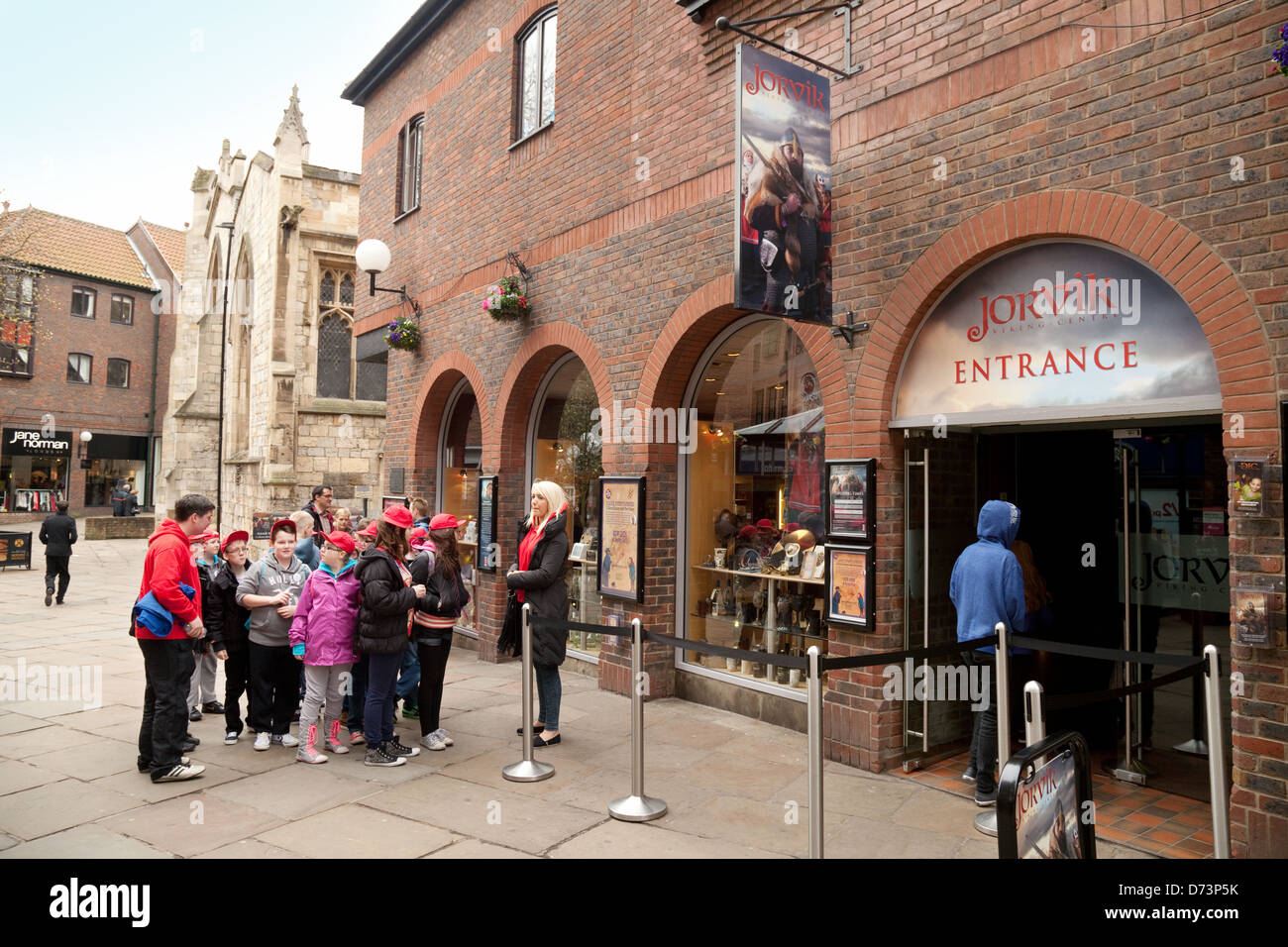 School children on a school trip waiting to enter the Jorvik Viking Centre, York, yorkshire, UK Stock Photo