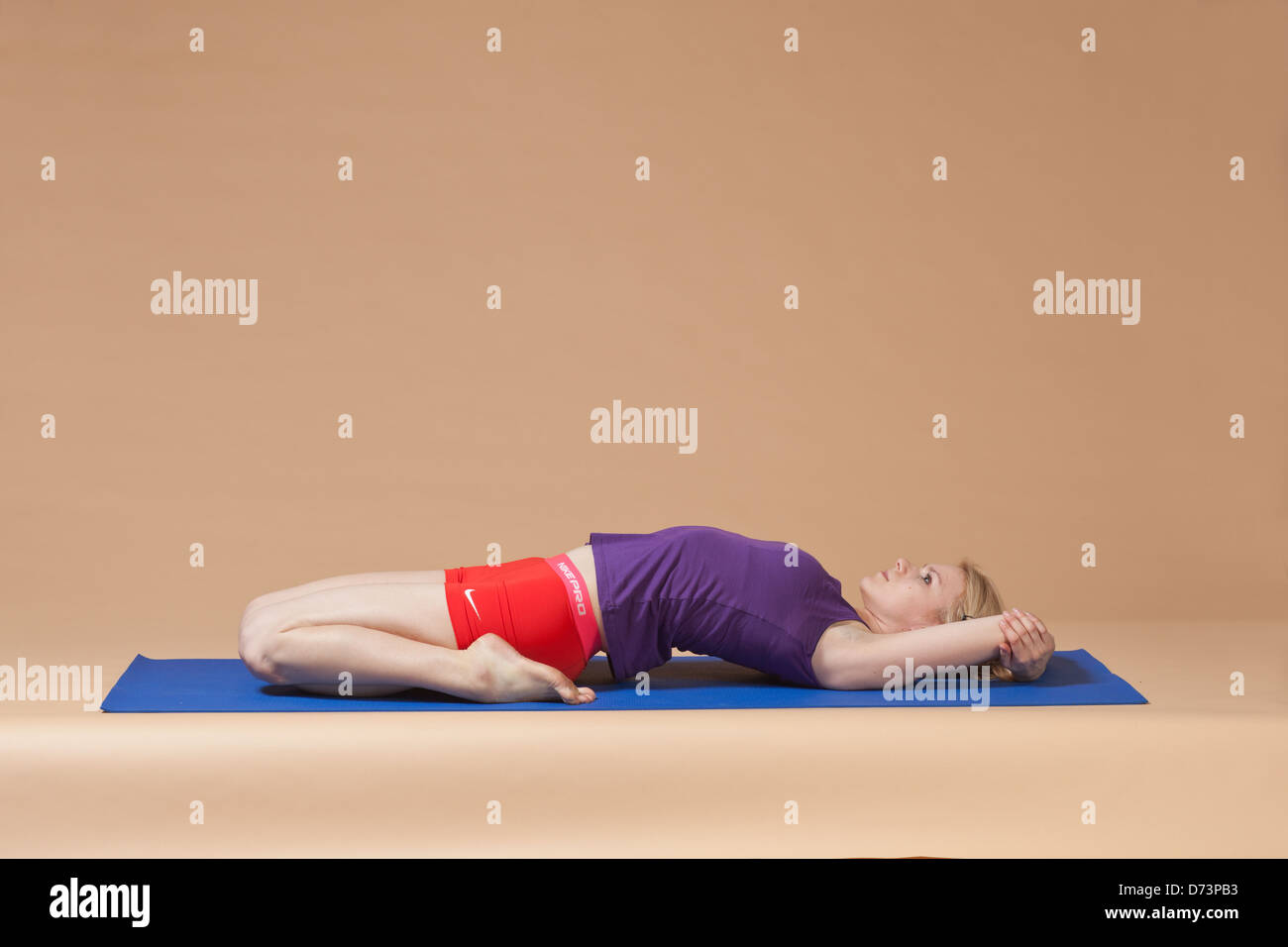 girl doing yoga Stock Photo