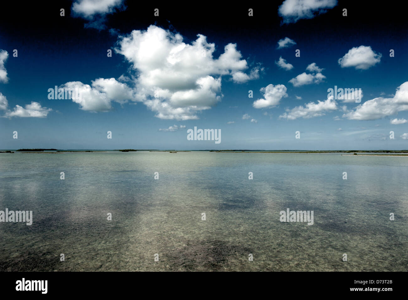 ocean view, clouds, reflections, blue sky, summer Stock Photo
