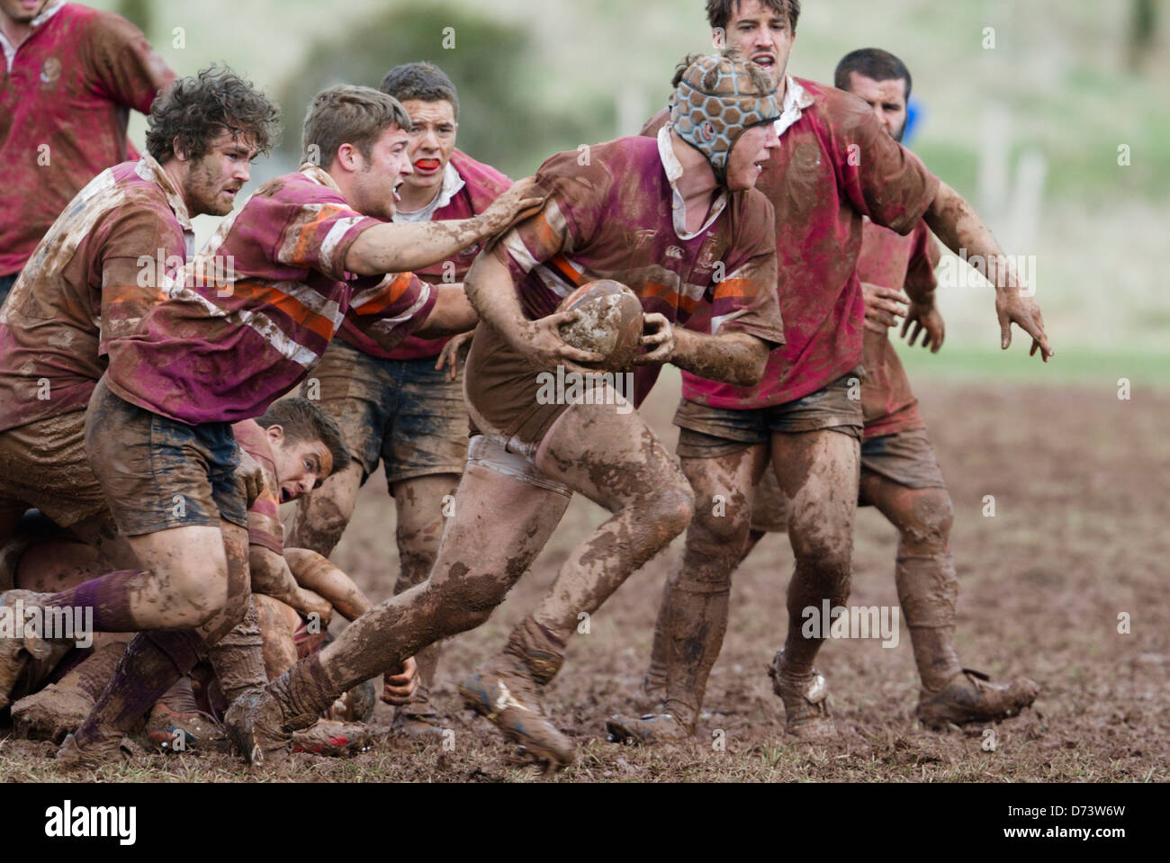 Virginia Tech players advance the ball against Harvard during a game at the annual Cherry Blossom Rugby Tournament. Stock Photo