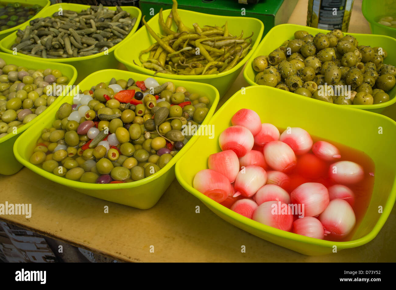 Traditional Spanish pickles on display on a market stall Stock Photo