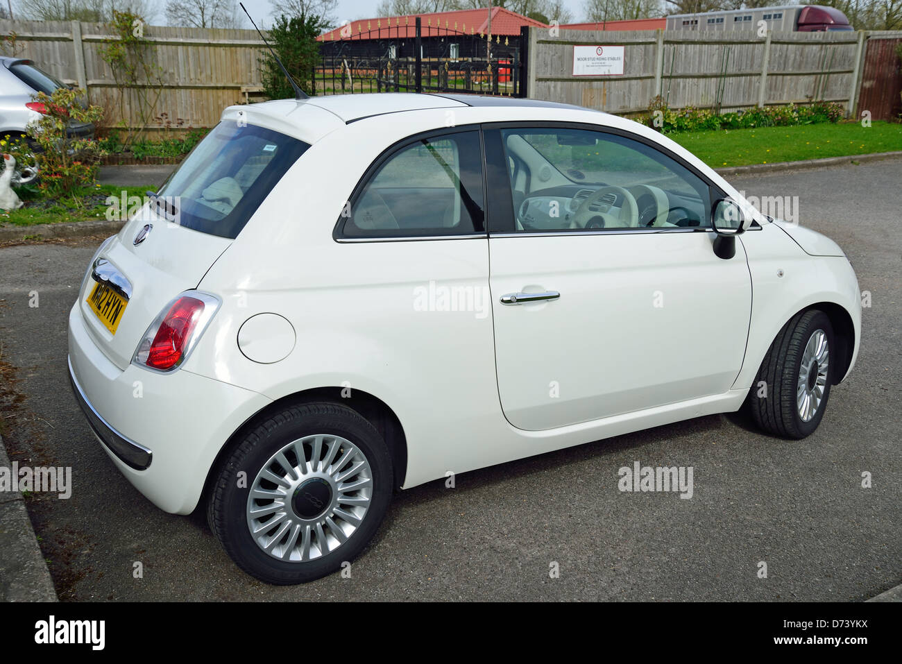 White Fiat 500 saloon car, Stanwell Moor, Surrey, England, United Kingdom Stock Photo