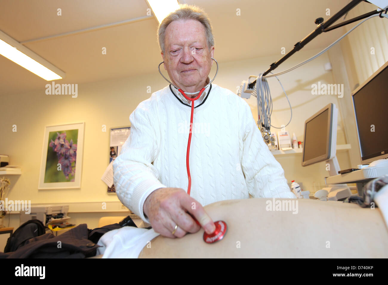 Bad Segeberg, Germany, Uwe thinker examines a patient in his practice without limits Stock Photo