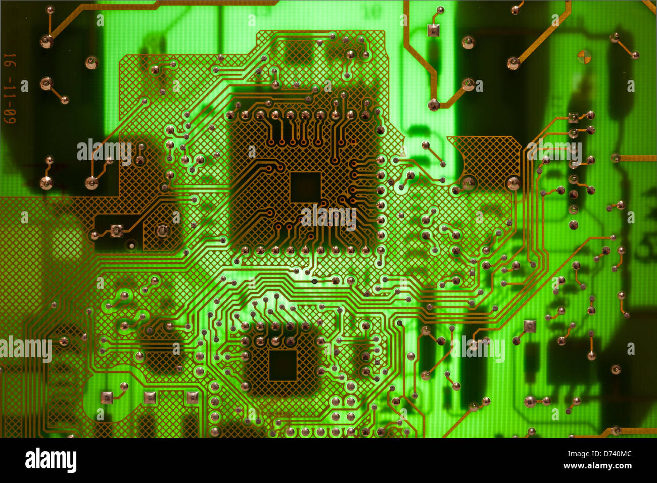 Circuit board or pcb in green light like the Matrix film Stock Photo