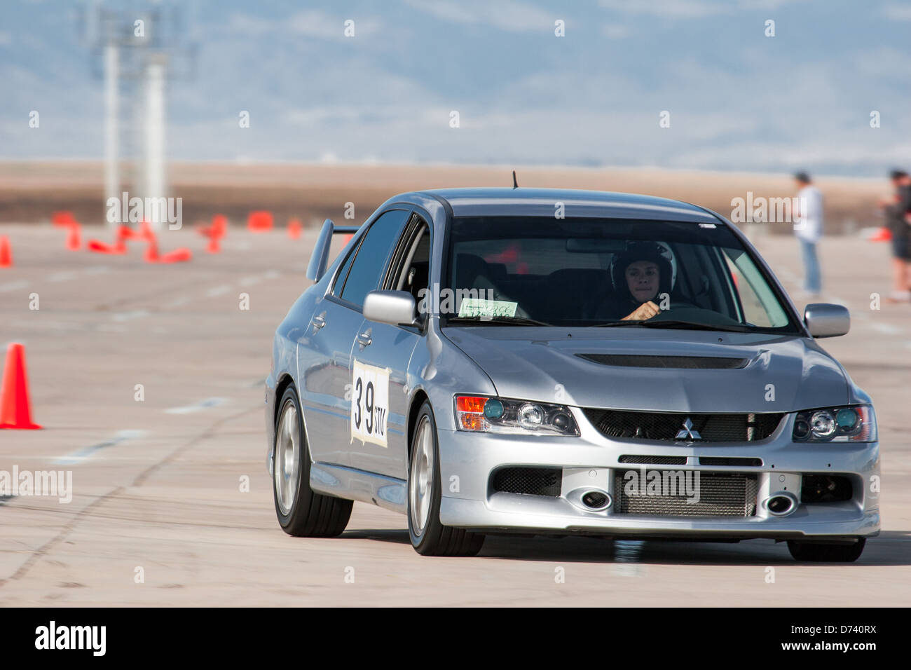 A 2006 Gray Mitsubishi Evolution 9 in an autocross race at a regional Sports Car Club of America (SCCA) event Stock Photo