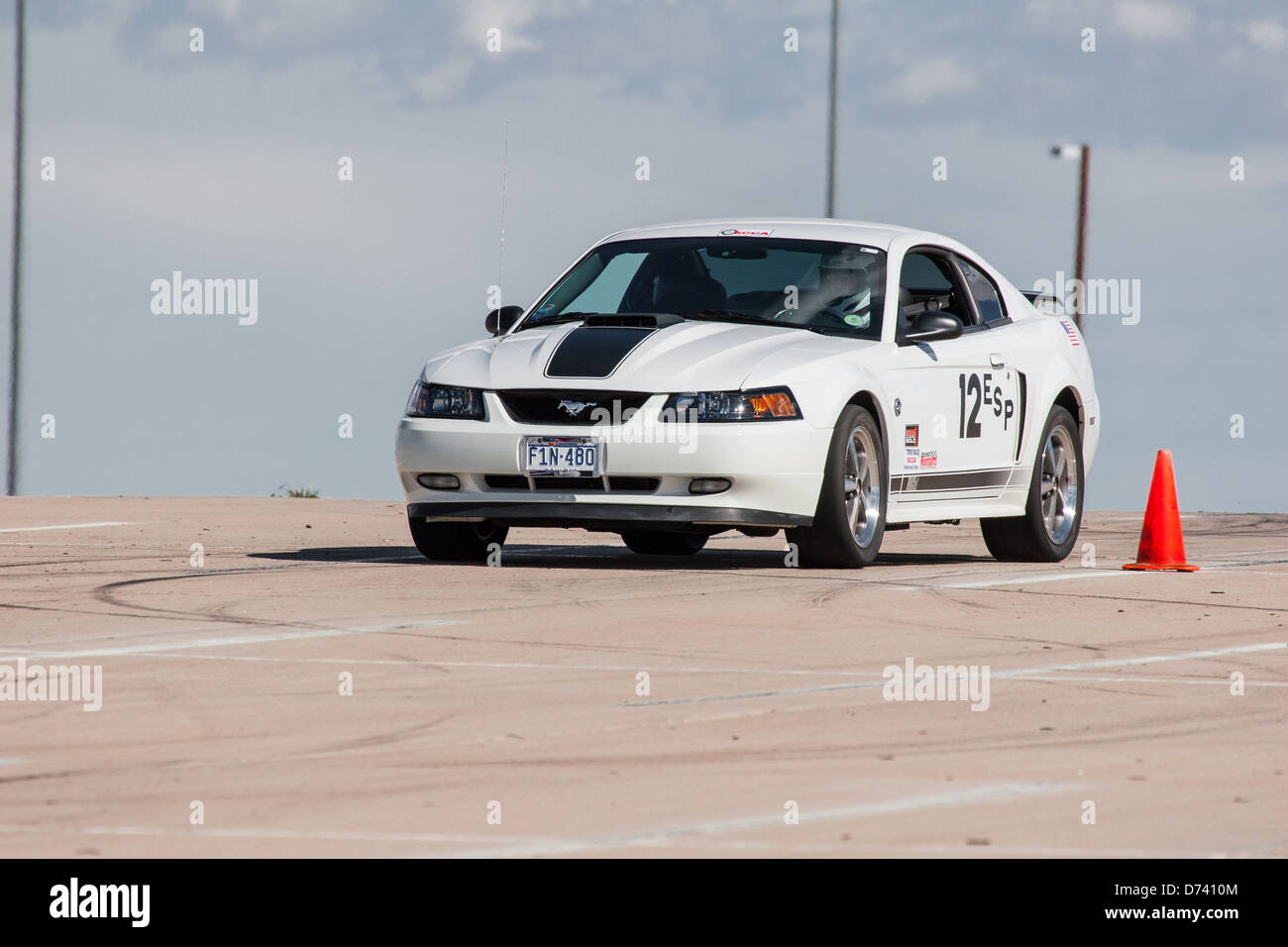 2004 White Ford Mach 1 Mustang in an autocross race at a regional Sports Car Club of America (SCCA) event Stock Photo