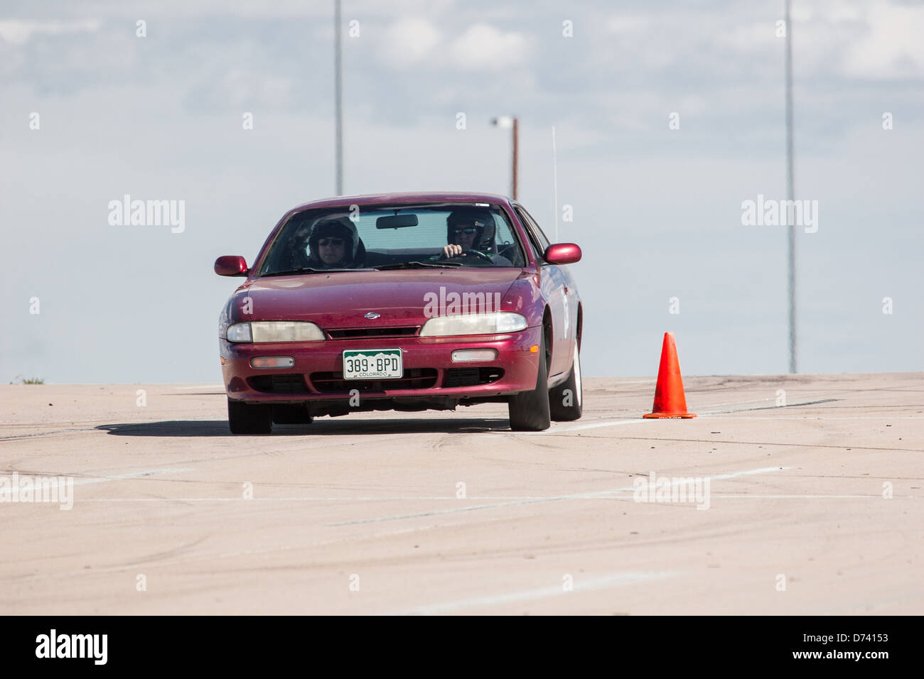 A 1995 Burgundy Nissan 200sx in an autocross race at a regional Sports Car Club of America (SCCA) event Stock Photo